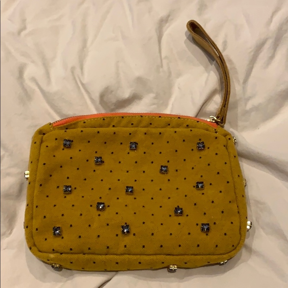 yellow velour clutch with gem details